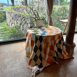 Bohemian checkered picnic blanket with tassels for outdoor camping and home decor