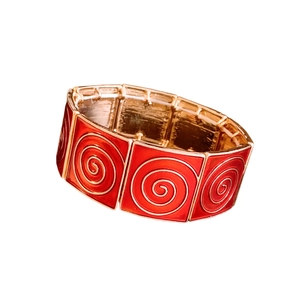 Vintage gold stretch bracelet with red enamel squares and relief spiral patterns