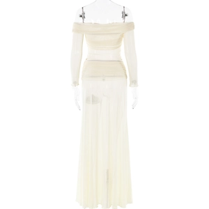 Detail of off-white two-piece set featuring a strapless long sleeve top and pleated maxi skirt