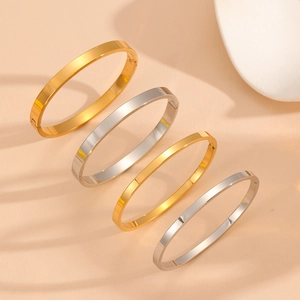 Minimalist stainless steel oval hinge bracelets set in gold and silver finish