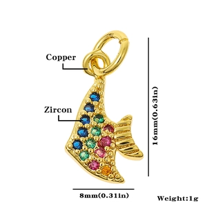 Macro view of gold copper fish charm with colored zircon stones and dimensions 16x8mm