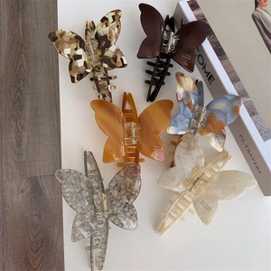 Elegant butterfly acetate hair claws in various colors for French vintage hairstyle