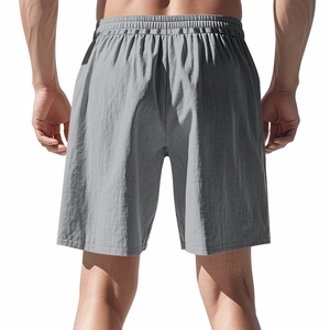 Detail view of grey linen shorts featuring elastic waistband and premium fabric texture