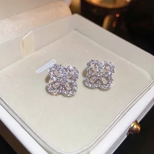 Sparkling four-leaf clover flower earrings with drop zircon and micro-pave crystals