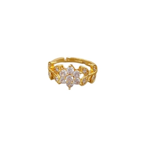 Adjustable gold flower ring with sparkling zircon stones and leaf accents on white background