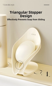 Close-up of the leaf-shaped soap box with a triangular stopper and drainage detail