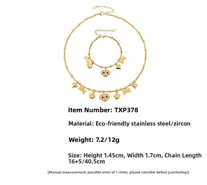 Détails du collier et bracelet en acier doré avec pendentif chiot serti de zircons