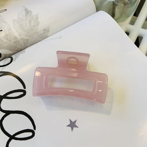 Pink translucent rectangular claw clip hair accessory for elegant women hair styling