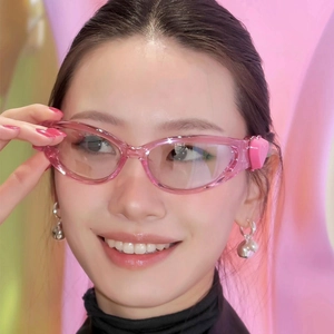 Millennial pink heart-shaped Y2K sunglasses with jelly frames and matching ear accessories