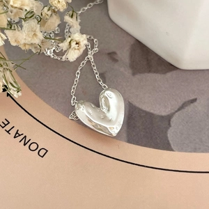 925 Sterling silver necklace with an artistic molten liquid heart pendant in silver finish