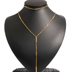 Minimalist gold stainless steel Y-shaped necklace with bar links on a black neck bust