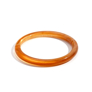 Minimalist amber acrylic geometric round bangle with translucent marbling and sand texture