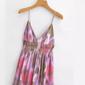 French style tie-dye floral slip dress with cinched waist in purple and pink tones