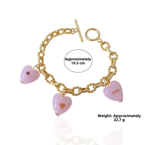 Pink heart glass charm bracelet with gold-plated chain and toggle clasp, 19.5cm length