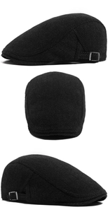 Detail view of herringbone flat cap with adjustable silver metal buckle on the side