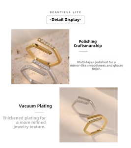 Detail of irregular open ring with gold plating and paved zircon stones in close-up shot