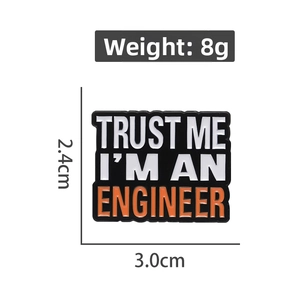 Detailed view of 3.0x2.4cm Trust Me I'm An Engineer enamel brooch with 8g weight specs
