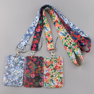 Floral ID card holder lanyard set in light blue, dark blue and cream white floral prints