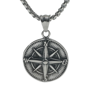 Vintage silver compass necklace with diamond accent and engraved eight-pointed star pendant