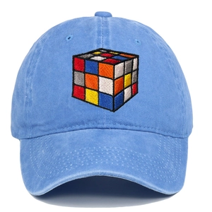 Detail of colorful Rubik's Cube embroidery on light blue washed cotton baseball cap