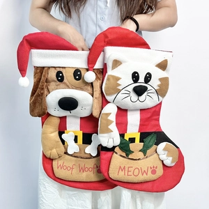 Christmas stockings set with embroidered dog and cat designs in red plush fabric