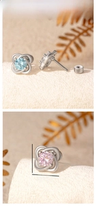 Details von Kleeblatt-Ohrsteckern mit Zirkonia, Schraubverschluss und 8,5 mm Größe