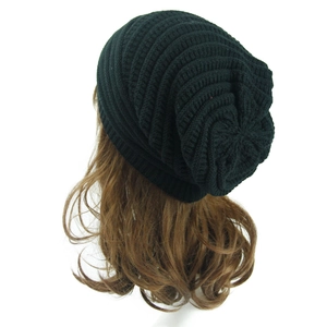Women's black slouchy knit beanie hat with fine twill texture for outdoor casual wear