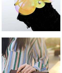 Detailed macro view of black sequin texture and colorful striped shirt fabric details