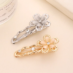 Y2K metal flower hair clips in gold and silver with rhinestones and opals
