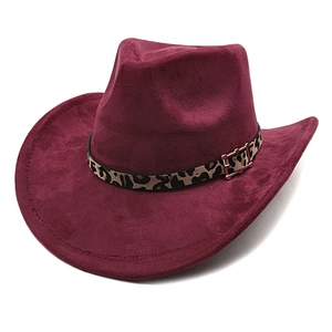Detail of burgundy faux suede cowboy hat featuring leopard print band and metal buckle