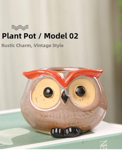 Close-up of owl ceramic planter with vintage brown finish and vivid red eyebrow details