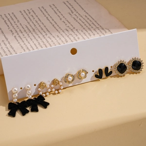 6-pair set of elegant bow pearl and heart stud earrings on white display card