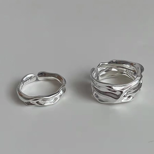 Minimalist S925 sterling silver ring set with irregular lava texture and metallic finish