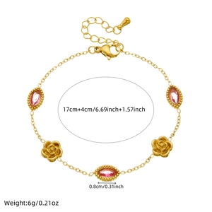 Detail of gold floral bracelet featuring pink marquise stones with size and weight metrics