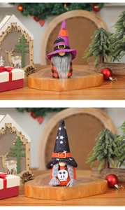 Detailed close-up of Halloween gnome plush ornaments with purple pumpkin and star hats