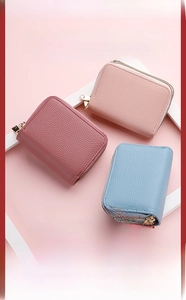 Three leather accordion card holders in pink and blue with premium metal zippers