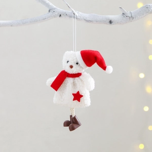 Christmas bear plush ornament with red hat and scarf hanging on a white festive branch