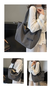 Detail of grey houndstooth tote bag with matching small coin purse and wide shoulder strap