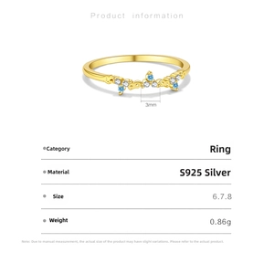 Detail view of gold S925 silver ring with blue and white zircon stones and size specs