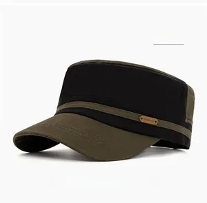 Detailed close-up of the OKSDFOX leather patch and stitching on the military green cap