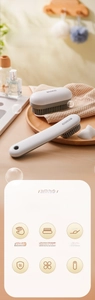 Detail showing 170-degree ergonomic angled shoe brush with dense soft bristles