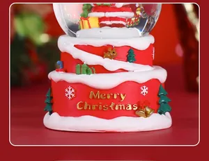 Close-up of red resin base with gold Merry Christmas lettering and festive snow texture