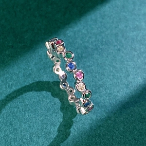 Minimalist silver ring with colorful gemstones in a circular bubble setting for women