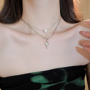 Elegant silver layered necklace featuring a white pearl and zircon butterfly pendant for women