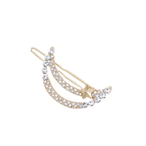 Elegant gold moon and star hair clip with sparkling rhinestones on white background