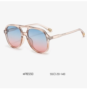 Detailed view of model P8330 aviator sunglasses with champagne frames and gradient blue lenses