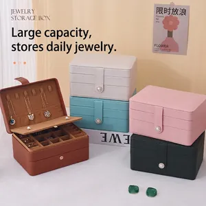 Elegant multi-layer leather jewelry storage box with pearl buckle and diverse compartments