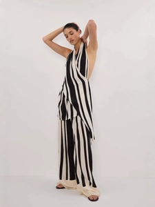 Elegant black and white striped halter backless top and wide-leg trousers set