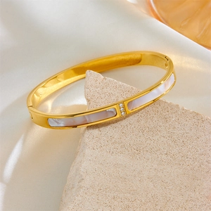 Rose gold titanium steel bangle with white shell inlay and three small diamonds