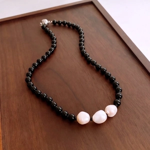 Ethnic style black glass beads and white baroque pearl pendant necklace with silver clasp